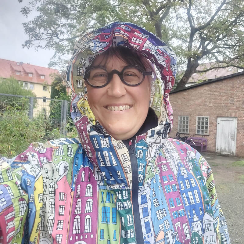 Der Häuser-Regenmantel Der Häuser-Regenmantel
